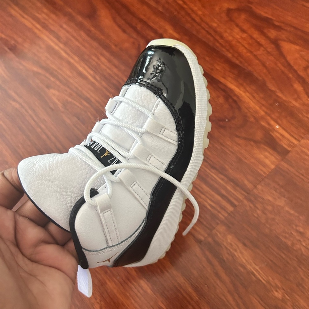 Jordan 11. Size 9c black and white.